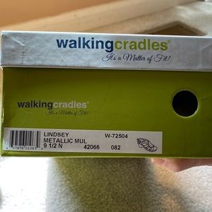 Walking Cradles metallic wedge sandals.